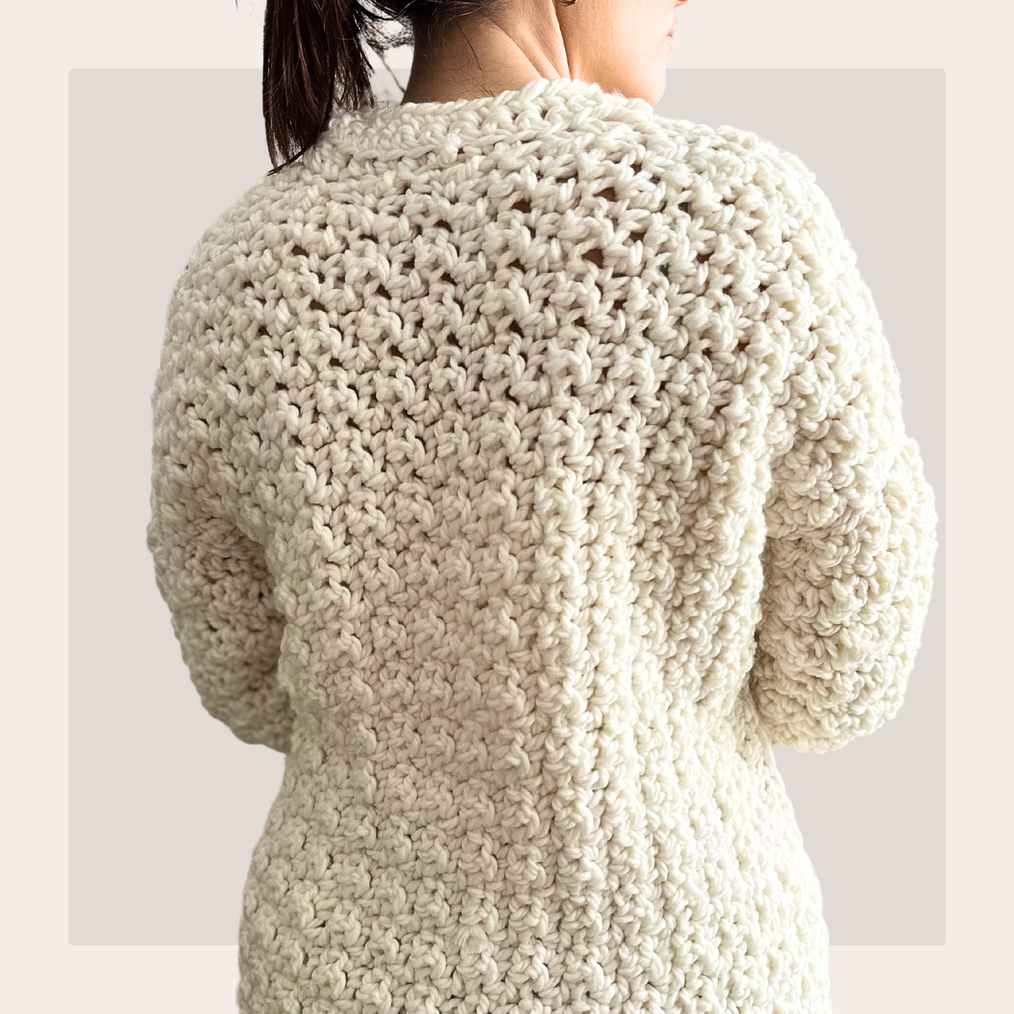 cat kemble showing the back of the lemon peel cardigan