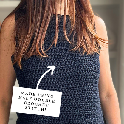 A woman wearing a sleeveless dark navy crocheted top, shown from the back. A white text box with an arrow points to the stitch texture, reading 'MADE USING HALF DOUBLE CROCHET STITCH!'.